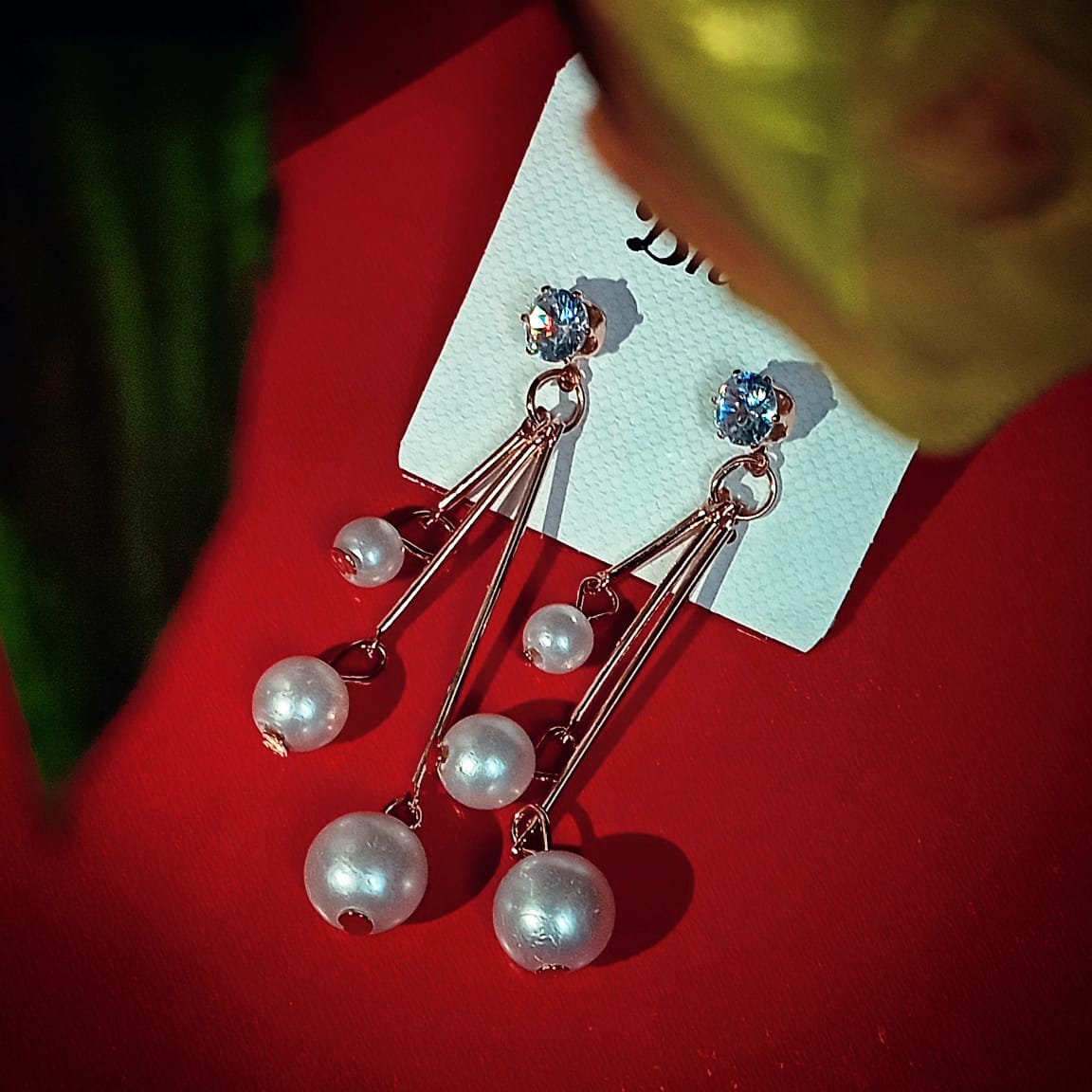 Kadhani's Cascading Pearl Elegance Earrings - A sparkling chandelier collection