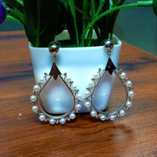 Kadhani's Pearl Royale Teardrop Earrings - A luxurious dangler collection