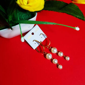 Kadhani's Pearl Cascade Dangle Earrings - A modern dangler collection